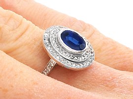 Oval Sapphire Ring with Diamond Halo wearing 