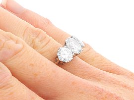 Three Stone Engagement Ring on Finger