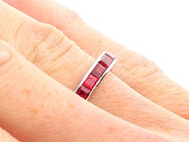 Baguette Cut Ruby Eternity Ring on Finger