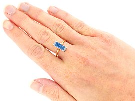 Gold Sapphire and Diamond Ring Wearing Hand