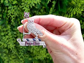 Diamond Owl Brooch in Platinum with Rubies and Sapphires outside