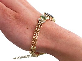 Peridot and Garnet Bracelet in Gold wearing