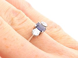 Cushion Cut Sapphire Trilogy Ring wearing