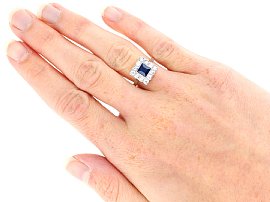 Square Cut Sapphire and Diamond Ring on the hand