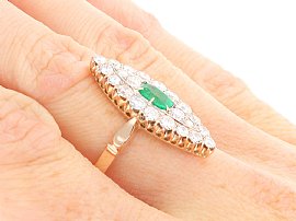 emerald ring on hand close up