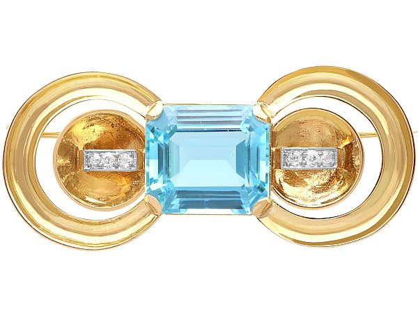 Emerald Cut Aquamarine Brooch in Yellow Gold