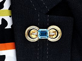 wearing diamond brooch