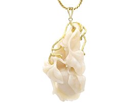 Carved White Opal and 14ct Yellow Gold Pendant