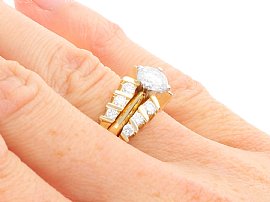 Wedding and Engagement Ring Set Gold on finger