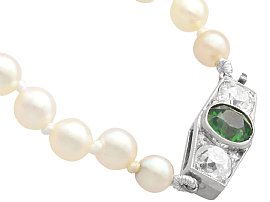 Pearl Strand Necklace with Green Sapphire Clasp