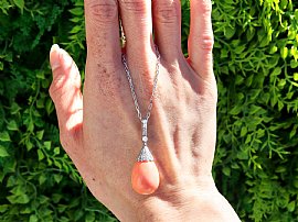 Antique Coral Pendant in Platinum outfit