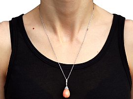 Antique Coral Pendant in Platinum wearing