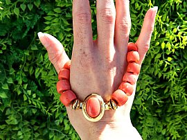 Vintage Coral Bead Necklace in Gold outside