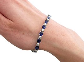 Diamond and Sapphire Line Bracelet on wrist