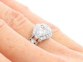 Three Stone Cluster Ring On the Hand