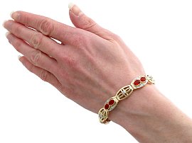 Fire Opal gold bracelet wearing