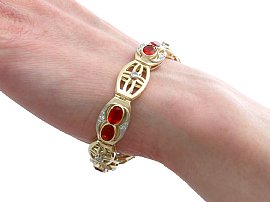 Fire Opal gold bracelet wearing