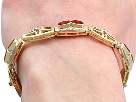 Fire Opal gold bracelet wearing