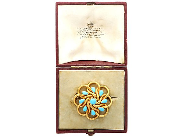 Turquoise and Gold brooch by Garrard Jewellers