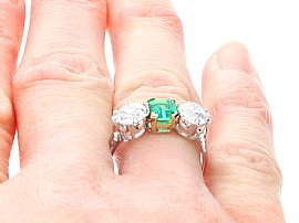 Antique Emerald and Diamond Trilogy Ring on finger