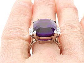 Cushion Cut Amethyst Engagement Ring on finger